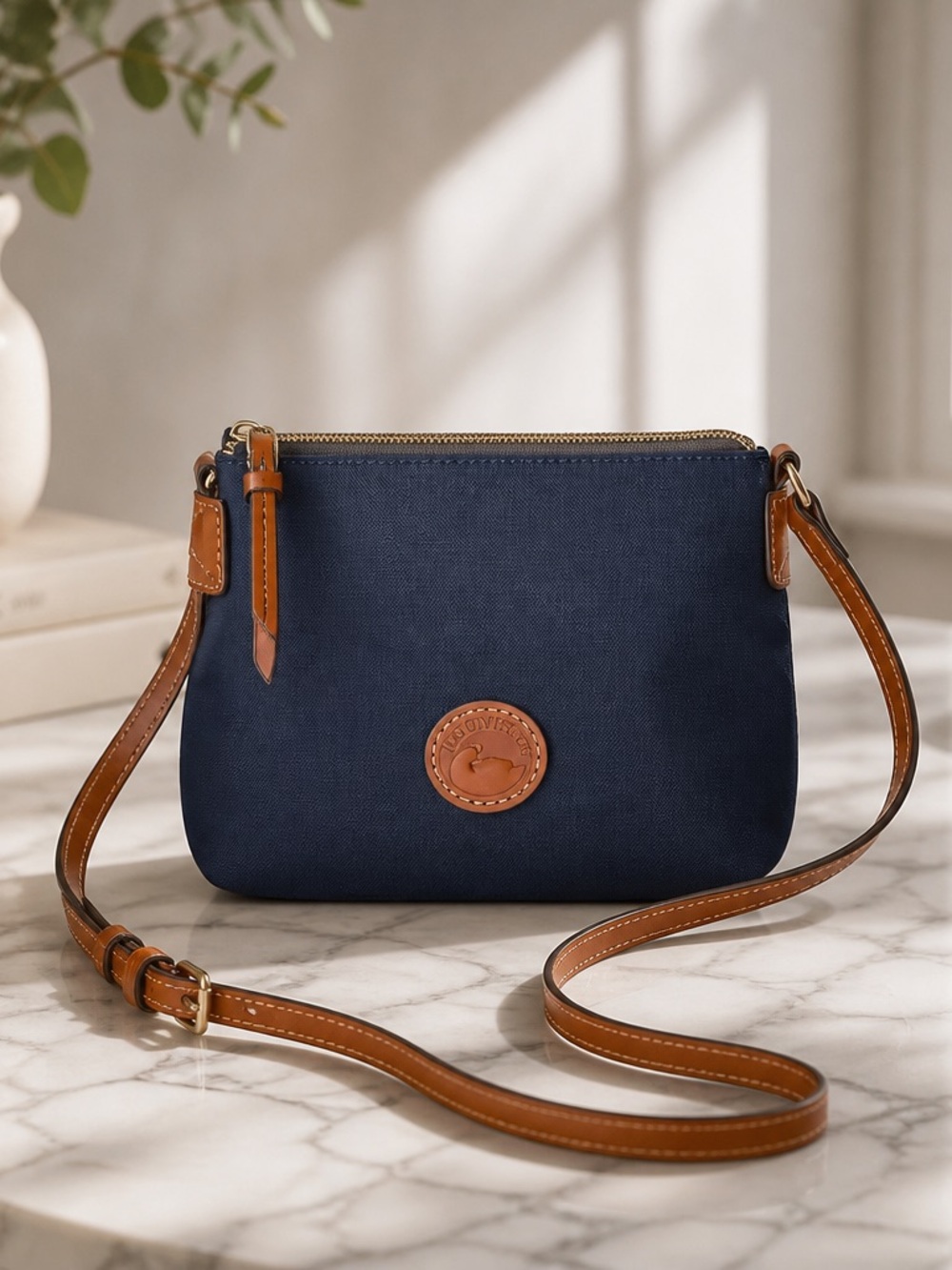 Dooney & Bourke Navy Crossbody with Brown Leather Strap
